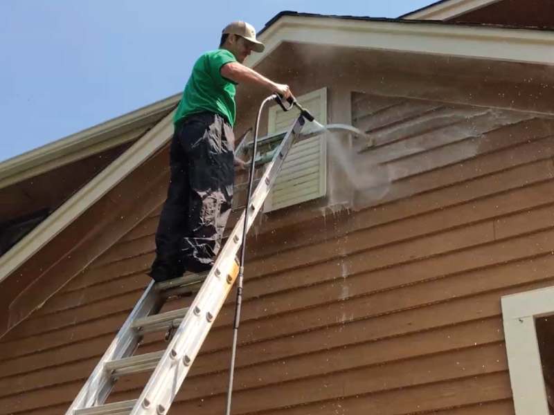 Pressure-washing-cedar-home-for-paint-prep