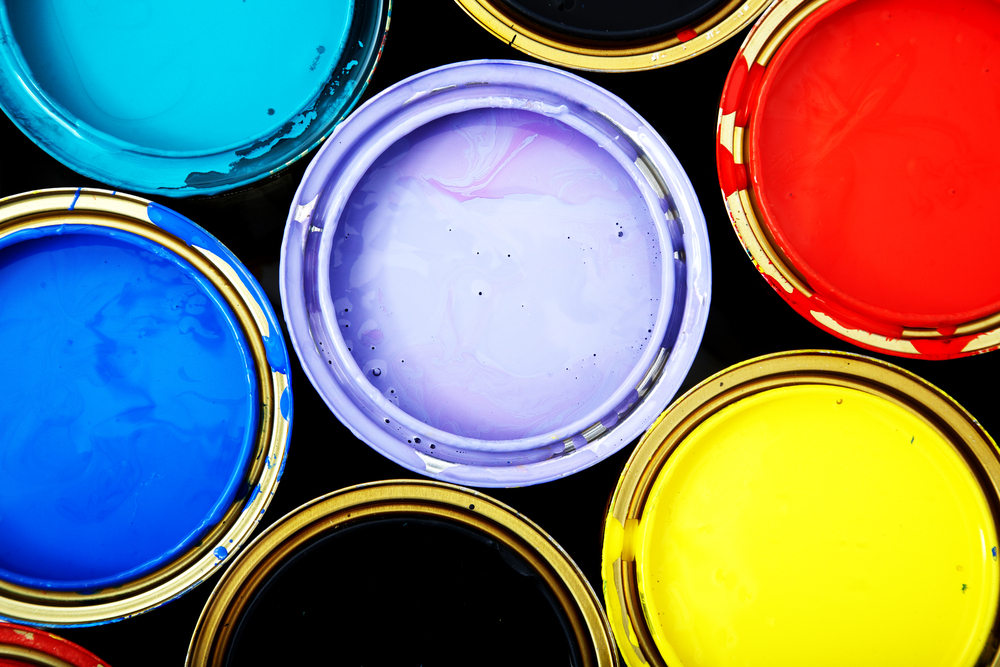 buckets of paint in different bright colours