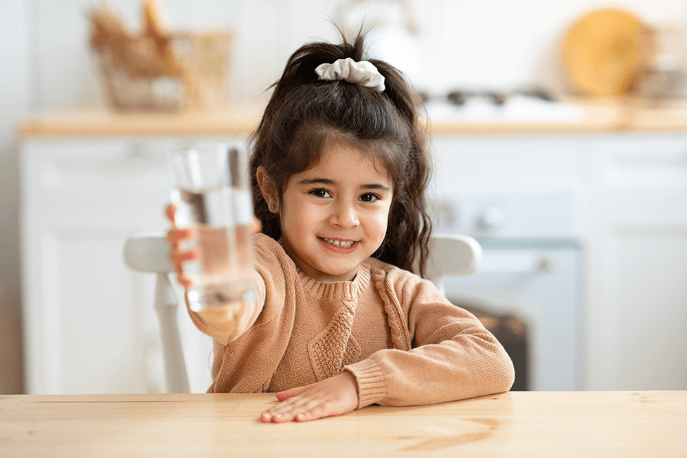 healthy-drink-cute-little-girl-holding-glass-with-2021-09-01-15-41-19-utc