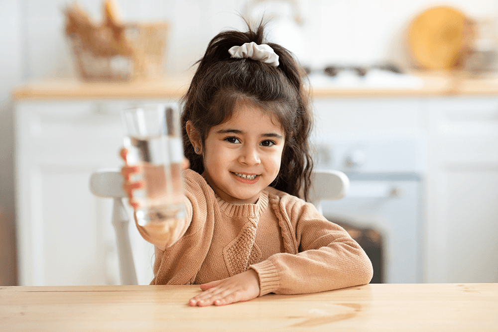 healthy-drink-cute-little-girl-holding-glass-with-2021-09-01-15-41-19-utc